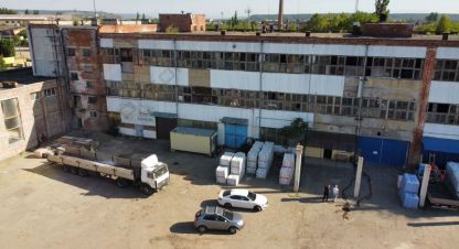 Купить производственно-складское помещение, 10000 кв. м. Фотография №1 Продам производственно-складское помещение с общей площадью 10000м2, на улице Коммунальник-2 тер снт, г. Майкоп, Адыгея респ., Россия, агентство Мореон Инвест. Фотография №1